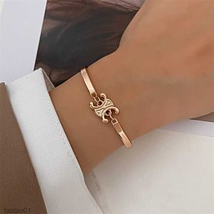 Celi nova liga de moda que preserva a bracelete de ouro do estilo francês French Style Triumphal Design feminino