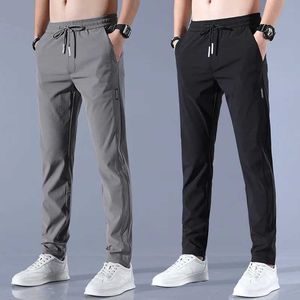Herrbyxor 2024 Ice Silk Mens Summer New Black Grey Thin Business Casual Pants Outdoor Elastic Breattable Straight Ben Sports Pants Y240513