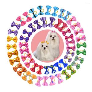 犬のアパレルグルーミングボウペット猫の髪のゴムバンドは、小型犬用のアクセサリーを提供します50/100pcs bow mix