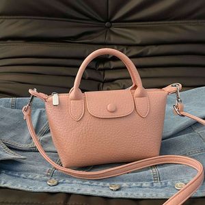 Modehandväska 85% fabrikskampanj ny bulle mini dumpling singel axelväska handväska crossbody womens väska