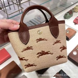 Handbag de moda 85% Promoção de fábrica Comércio Xiang Bag bordado grama bordada tecido tecendo grande capacidade de mão