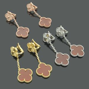 Especialistas em moda recomendam brincos de jóias douradas de quatro folhas de flor dupla para feminino com águas com brincos comuns de vanly