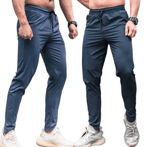Мужские брюки мужчины, работающие на фитнесе тонкие спортивные штаны мужской случайный спорт на открытом воздухе