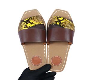 Kvinnor tofflor Summer Rubber Sandals Beach Sliders Scuffs inomhusskor Designer Canvas Cross Woven Outdoor Peep Toe Woody Casual S8498002