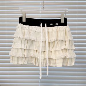 Krótkie designerskie sukienki dla kobiet Modka prosta biała krawat ciasto spódnica letnia nowa litera haftowa spódnica A-line