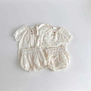 Zestawy odzieży 2018 NOWOŚĆ BABY Summer Summer Short Sleved Zestaw odzieży bawełniany Baby Flower Top+Shorts 2-częściowy dziewczyna pp spodnie setl2405