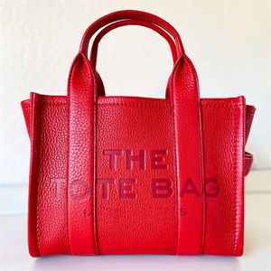 ファッションレディールリアルレザートートバッグマンLuxurys Handbag Designer Travel Cross Body Shopper Bag Clutch Satchel Pochette High Capacity Weekend Dellound Bags