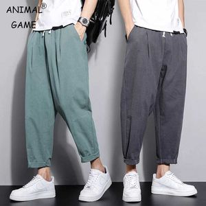 Pantaloni da uomo a strisce di abbigliamento da uomo pantaloni in cotone pantaloni lunghi pantaloni da canna fanatica di pantaloni harem pantaloni larghi y240513