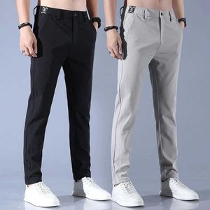 Męskie spodnie męskie spodnie z jedwabiu lodowe Solidny kolor Mid-Pistm Lose oddychające proste spodnie, cienki szybki sport sportowy Y240513
