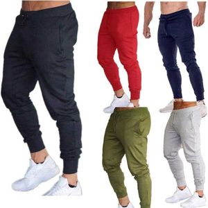 Męskie spodnie MĘŻCZYZNE PANTY SŁOŻNE Strony Spodnie Nowe w mężczyzn Clonthing Fitness Sportu