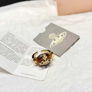 Мода Westwoods New Ring High Edition All Copper True Gold Electrated Eye Stone Saturn Nail Nail