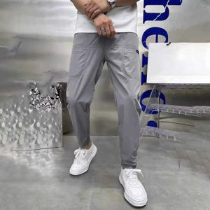 Мужские брюки мужчины повседневные брюки эластичная талия с несколькими карманами высокая эластичность длина лодыжки ежедневная износ Slim Fit Мужчины карандаш.