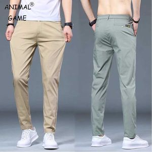 Pantaloni da uomo nuovi pantaloni di seta di ghiaccio uomini sottili elastico elastico leggero elastico di cotone classico pantaloni coreani maschi maschio grande abbigliamento sudato da jogging y240513