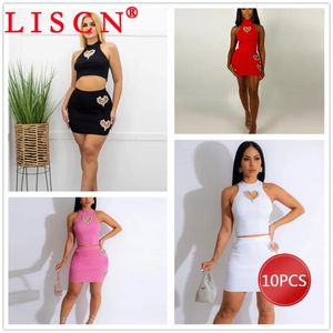 Çalışma Elbiseleri 10 Toptan Ürünler Elbise Setleri 2024 Hollow Out Rhinestone İki Parçalı Set Kadın Kıyafetleri Kolsuz Mahsul Üst Mini Etek K13640