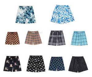 Мужские шорты 2024 Дизайнерский стиль водонепроницаемые ткани брюки взлетно-посадочной полосы летние пляжные брюки Мужские шорты мужчины для серфинга шорты плавающие болоты