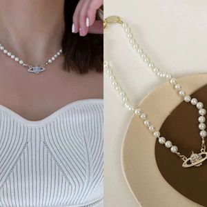 Designer necklace, classic Saturn pearl necklace, women's irregular Baroque clavicle chain, niche design, European and American necklace