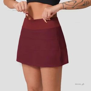 Designer feminino saia ioga tênis ritmo rival Rival Roused Gym Roupos de ginástica feminina roupas de ginástica esportes ao ar livre de fitness calças de golfe esportes de golfe esportivo