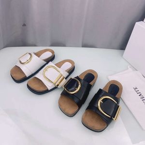 KHAITE THOMPSON GOLDEN FURCHULLLLED SLIDES SLIPPERS SLIPE LUXE SLIPE SANDALS SANDALS DE PRAIA ABRIL