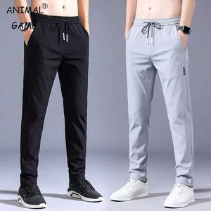 Men's Pants Summer Mens Casual Pants Thin Soft Elasticity Lace-up Waist Solid Color Pocket Applique Korea Grey Black Work Trousers Male 38 Y240513