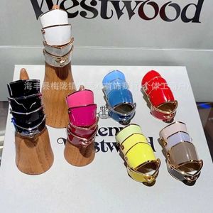 Designer Westwoods colorido NDED Four Seção Armadura Saturno Ring Mens e Mulheres Punk Style Planet Planet High Edition Nail