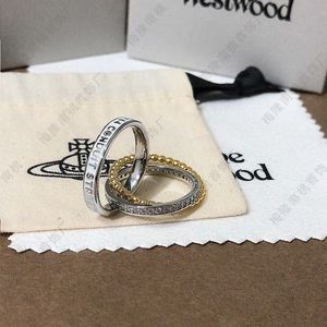 Brand High version Westwoods cool and style three ring dynamic zircon Saturn neutral Nail
