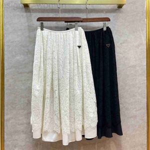 Skirts designer Lace water soluble embroidery hook flower half skirt with versatile temperament triangle logo large swing fluffy skirt medium length half skirt