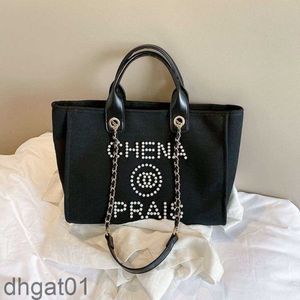 Womens luxury shopping Bag designer handbag beach bag large capacity pearl embroidery canvas tote bag portable high sense classic chain One Shoulder bag