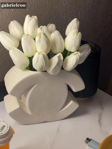 Luxury ceramic vase designer classic logo shape white vase INS style high-end floral vase cream style Nordic Dining table decoration vase home entrance ornaments