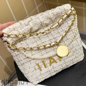 Designväska lyxig pärlmetallkedja påse ullsopping påse guld metall hängare underarmsäck stor kapacitet axelväska på väska handväska crossbody handväska axel