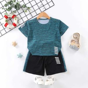 Giyim Setleri Çocuk Kısa Kollu Spor Giyim Sıradan Erkekler ve Kızlar Yaz Yeni T-Shirt Şort İki Parçalı Set D240514