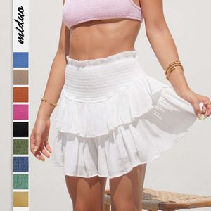 Fashion plain color women's summer new product fashion pleated sexy spicy girl lotus leaf short skirt F51438