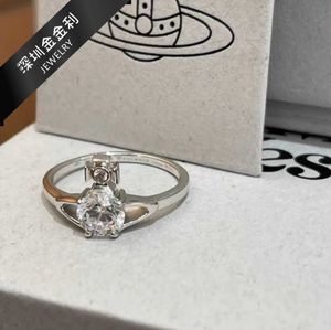 브랜드 Westwoods Light Luxury Sweet Full Diamond Reina Four Claw Zircon Saturn Ring Gun 검은 자주색 손톱