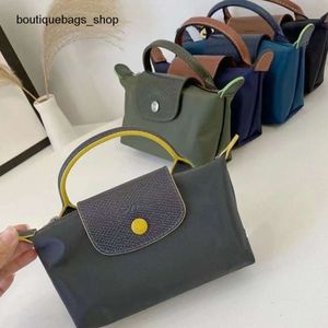 Luxury Leather Designer Brand Women's Bag Nylon New Minimini Handheld Crossbody Bag Mini PhoneKDMY