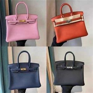 2024 Platinum Bag Designer Tote Cowhide Women's Briefcase Single Shoulder Diagonal Straddle Women's Handbag Color Matching Real Belt NHBT