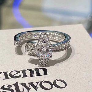브랜드 Westwoods Full Diamond 지르콘 수평 토성 반지가 반짝이는 매력과 흰색 중립 커플 네일