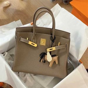 Bag Designer 2024 Fashion Platinum Layer Cow Leather Lychee Grain Leather Women's Handbag One-shoulder Cross-body Carrie MYWF