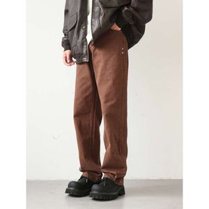 Amerikanska bruna jeans för män unga människor. Lös, rak, gata, hög och smal casual byxor. Studentlånga byxor