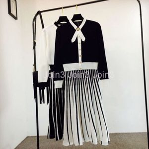 New spring autumn fashion womens elegant black white color block bow collar pearl buttons knitted sweater and pleated long skirt dress suit