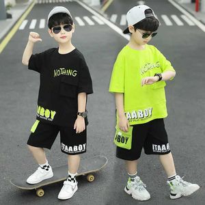Giyim Setleri 2024 Yeni Moda Yaz Gençlik Erkek Giyim 3-12 Koreli Leisure T-Shirt Şort 2 PCS Set Eğlenceli Çizgi Film Giyim D240514