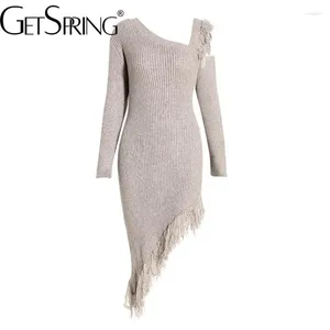 カジュアルドレス女性ドレス2024秋の冬の斜め襟不規則なタッセルスリムラップヒップ非対称裾のニットセーター