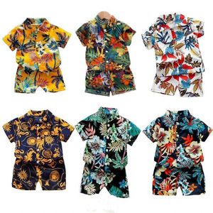 Conjuntos de roupas de 1 a 6 anos de menino de menino floral estampado conjunto de roupas de verão menina curta de mangas curta camisa de criança+calça 2 peças de roupas de férias para crianças roupas de praia d240514