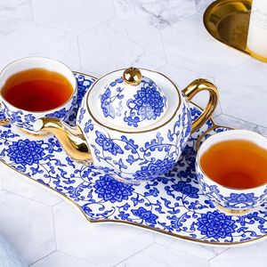 Teware Sets Çin Kemik Çin Oturma Odası Çalışması Geleneksel Zarif Ruyi Mavi Lotus Çay Seti Ev Çayını Çay Fincanı Sakrı