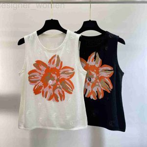 Frauen-T-Shirt-Designerin Heavy Industry PECING Sticked Blumengestricke Pullover für Frauenkleidung Wolle Weste kleiner duftender Stil ärmellose Top 25jy