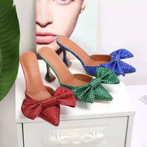 جلود جديدة 2024 Sheepeskin Sandals 10cm Goblet Stiletto Hih Hiel Pumps Women Slipper Summer Pillae Bionted Toe Bowtie Size 35-43 Slip-On Payty SAA