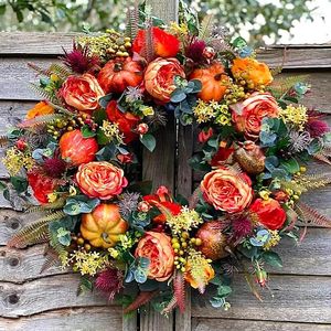 装飾的な花は牡丹とカボチャのヒマワリの花輪の玄関祭りのお祝いハロウィーン装飾ラタンガーランドの家