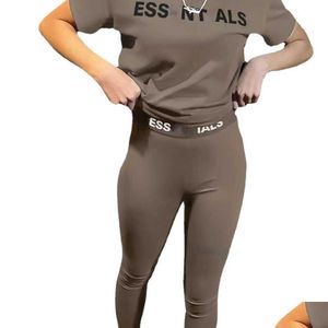 Pontas femininas de rastreamento de grife feminino Duas peças Jogger Conjunto de novas letras impressas Manga curta Y Fashion Tights Suits Yoga Pant eshslf