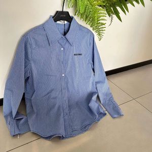 MM Famiglia SS Nuova camicia a scacchi blu sottile alla moda e versatile con design del cuffia per bordo in pelliccia semplice