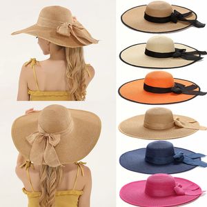 女性のための幅15cmの幅の縁のビーチストロー帽子シンプルな折りたたみ式夏の外出サンハットファッションフラットブロムボウノットUV保護パナマ240515