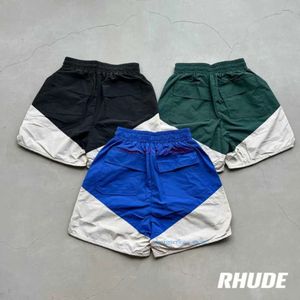 Mens korta designer shorts kvinnor mode avslappnad semester strand konserverad rhud high street tung industri skarvade vävda par löst man outfit