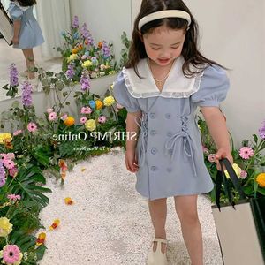 Sukienki dziewczyny urocze dziewczynka puszystą bandaż bandaż letnią koronkę lapel koreańską kurtkę dziecięcą imprezę dziecięcą ubranie D240515